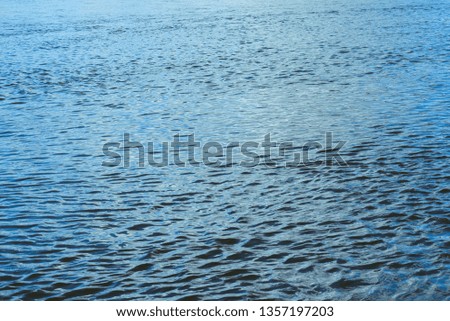 blue river flowing water background texture selective focus
