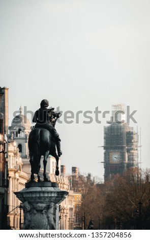 Equestrian Statue of Charles I at Trafalgar Square with Big Ben, part of the Houses of Parliament, in the distance