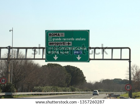 road junction in the italian highway and indications to ROME or Civitavecchia city and other italian place