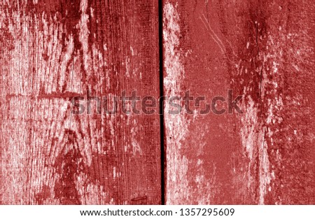 Old grungy wooden planks background in red tone. Abstract background and texture for design.