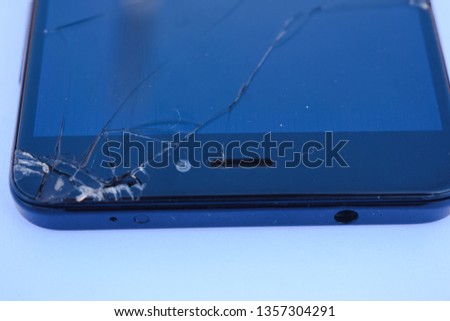 Close up of a broken display of a  smartphone. weak display of a  phone isolated on a white background. 