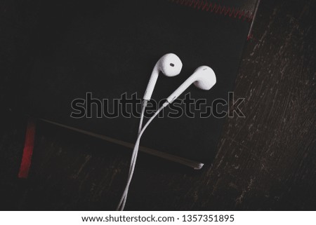 Notebook and headphones with matte color