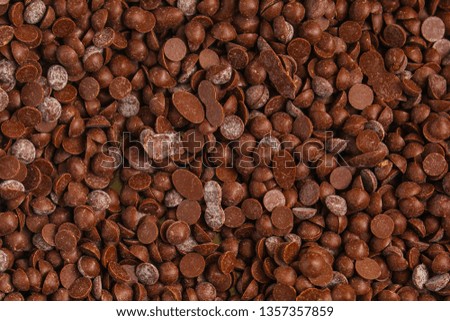 chocolate drops (sweets). food background. copy space. top
