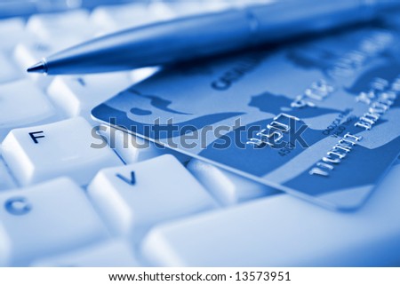 Credit card over a keyboard