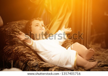 A Christmas nativity scene with baby Jesus