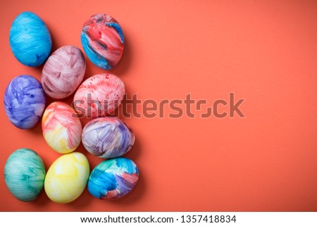 Easter eggs on coral color background.. 2019. Easter ideas. Space for text. Happy easter.