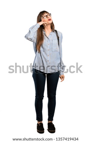 Full-length shot of Woman with glasses making phone gesture. Call me back sign