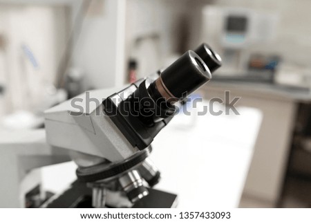 microscope on table in laboratory. Research and analysis.