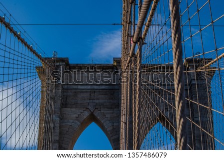 Brooklyn bridge with its beautiful brick details and metal ropes closeup