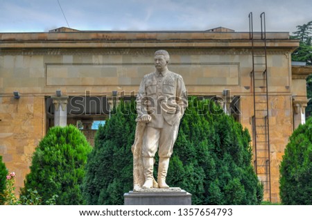Sculpture of Joseph Stalin outside his house and museum In Gori, Georgia. Royalty-Free Stock Photo #1357654793