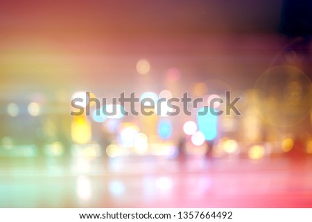 Abstract colorful circular bokeh with city background
