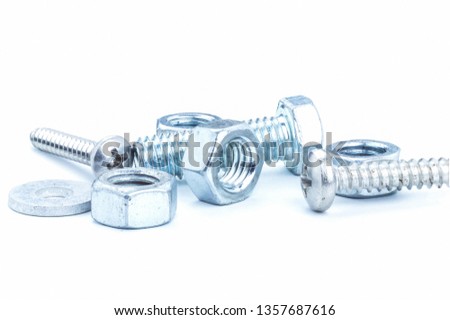 Closeup Bolts, steel screwbolts and nuts Used for capturing workpieces mechanical parts And construction isolated on a white background industrial concept