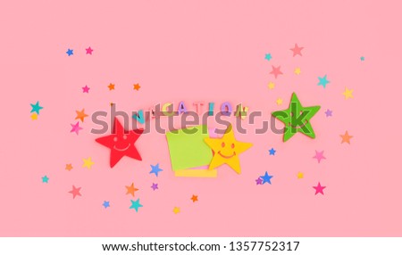 vacation, holiday minimal concept. Pink background with letters inscription "Vacation", cute stars. Flat lay. children's school holidays, vacation with children, entertainment