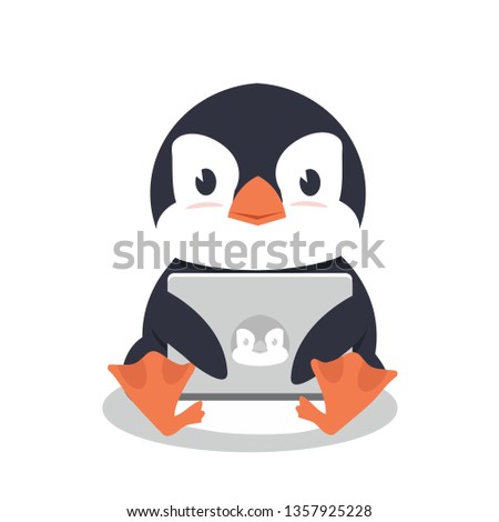 Penguin sitting with a laptop