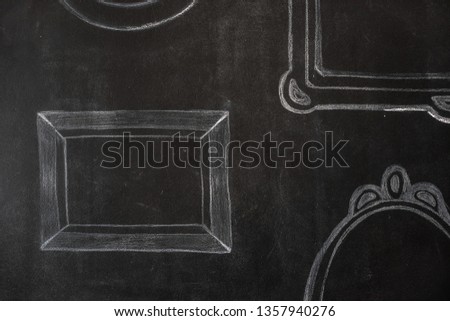 frame is drawn in chalk on a black Board. The banner is a stylized painting. Chalk outline for layout design. Free space
