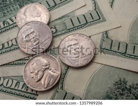 American dollars bills and coins cents