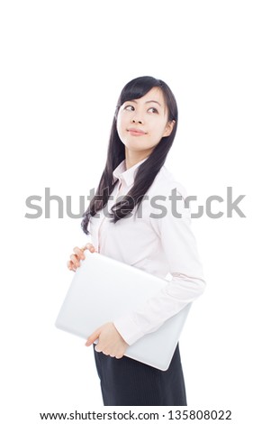Attractive smiling young business woman holding laptop computer, isolated on white background