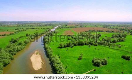 Aerial View 4k. Flying over the beautiful River. Aerial camera s