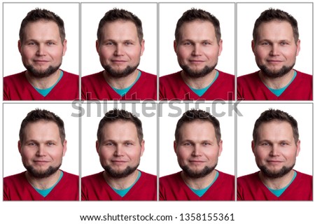 Portrait of bearded man looking at camera isolated on white background. Guy takes photo for passport or for identity card at studio