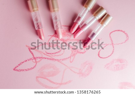 lipstick on a pink background