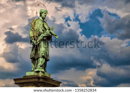 Prague, old statue of Nepomuk on Charles Bridge