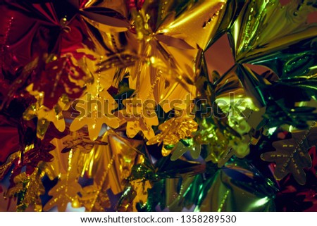 Image of multi-colored tinsel.