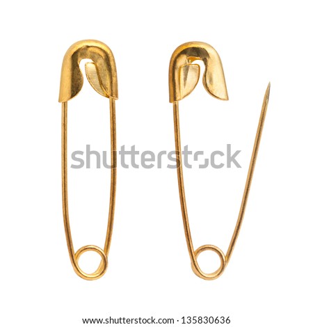 golden safety pin Royalty-Free Stock Photo #135830636