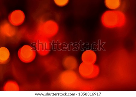 Colorful bokeh with neon lights at night time, motion movement with traffic light in the city on car windshield view, blurred light background. Speed fast with driving car. Long exposure.