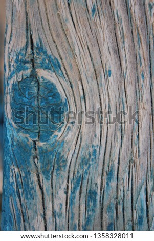 Wood Surface with Turquoise Peeling Paint.