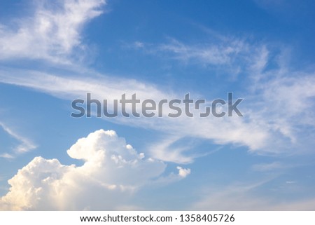 Blue sky background with clouds. Blue sky landscape using as a background or wallpaper. - Image