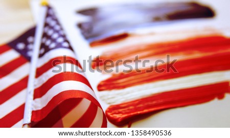 The USA flag painted on white paper with watercolors, toned vintage