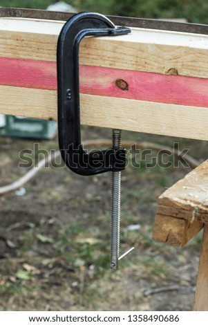Bonding of wooden parts in the construction house outdoor