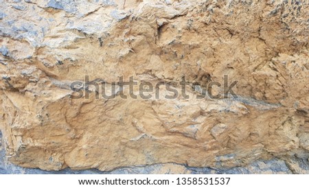 Rustic stone, The texture of stone wall corrosion or grunge stone texture use for web design and wallpaper background. Old Distressed Brown Terracotta Copper Rusty Stone Background
