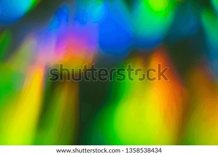 Blurry lights background. Defocused lens flare glow. Abstract illuminated bokeh design.