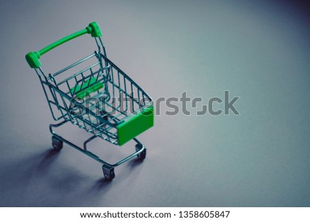 Empty shopping basket on grey background