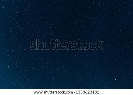 Night blue sky with stars. The texture of a blue sky with stars. Royalty-Free Stock Photo #1358623181