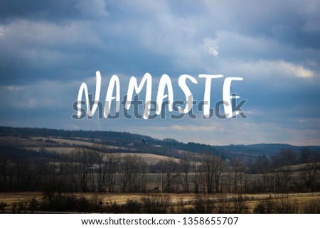 country landscape with text namaste