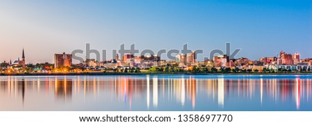 Portland, Maine, USA downtown skyline from Back Cove at dawn.