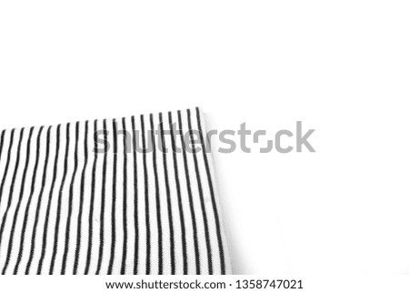Black and white pattern as background.