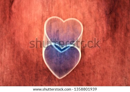 colorful abstract blurry heart shaped sign and symbol as background 