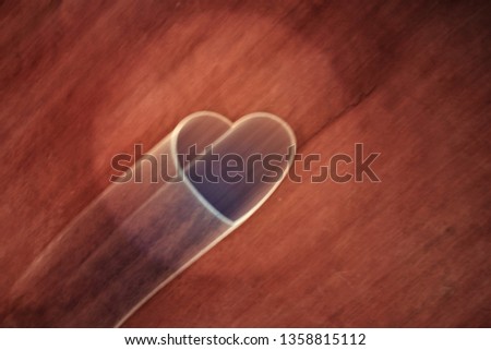 abstract artistic blurry heart shaped sign and symbol as background