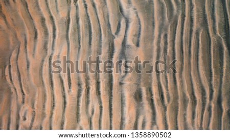 Aerial top view, The surface of the sand beach background ,Wallpaper