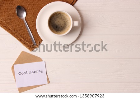 
cup of coffee on wooden background top view. Good morning! Have a nice day