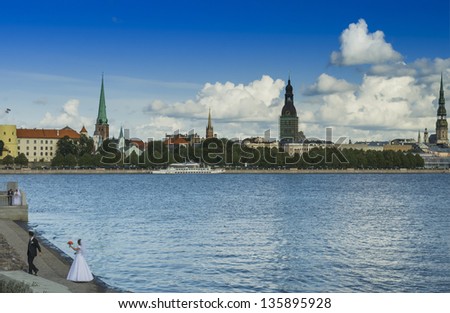 View on the old city from embankment of the Daugava river, Riga