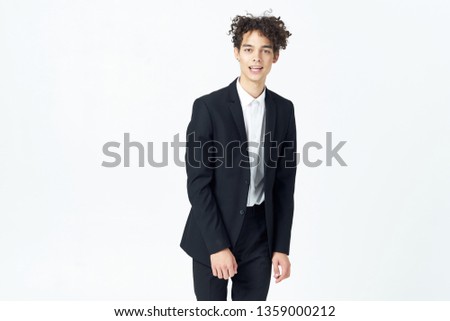 Curly guy in a suit cropped look                        