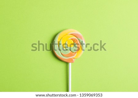 Sweet candy with space for text on color background, top view