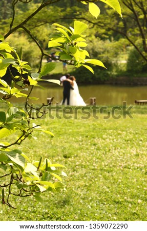 Couple getting married and taking pictures in the forest