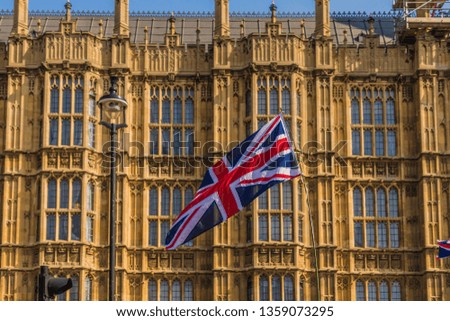 March 29 2019. London. Union flags flying by parliament in parliament square London Royalty-Free Stock Photo #1359073295