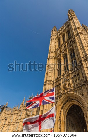 March 29 2019. London. Union flags flying by parliament in parliament square London Royalty-Free Stock Photo #1359073304