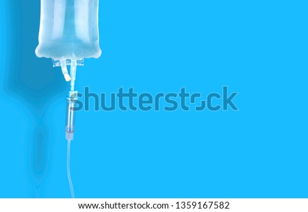 IV drip chamber, IV tubing, and IV bag of solution with copy space.
 Royalty-Free Stock Photo #1359167582